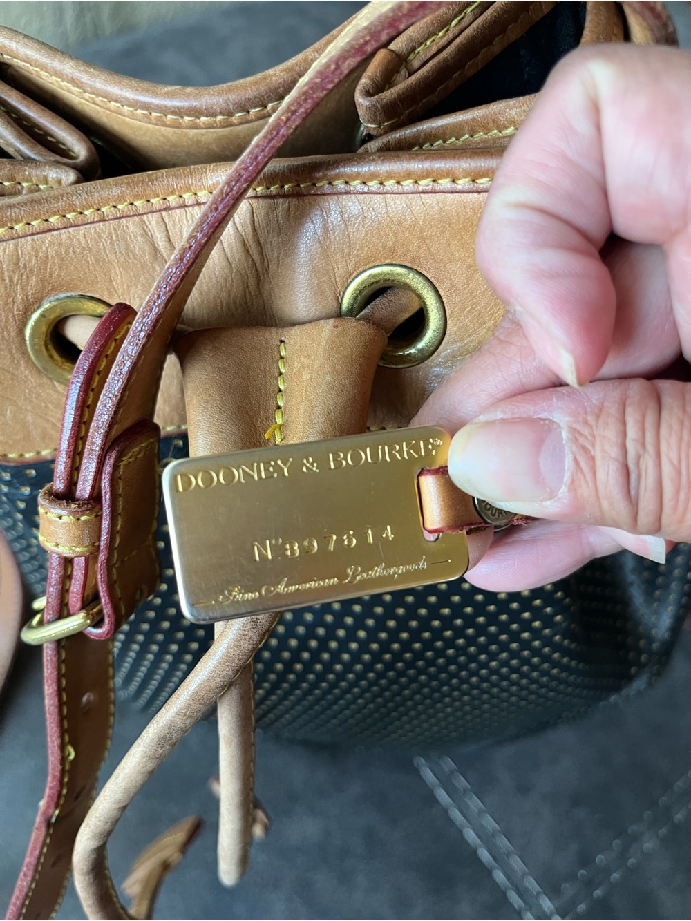 Dooney & Bourke-Vintage Black and Tan Drawstring Bucket Bag with Gold Studs - Picture 6 of 10